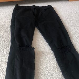 Woman Black Ripped Jeans